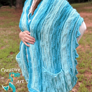 Crocheted Sea Breeze Pocket Shawl Long in Aqua Seas, Women Shawl, Sea Breeze Collection, Mermaid Fashion, Unique Gifts, Handmade Cozies, Handmade Fashion, Mermaid at Heart, Ocean Crochet, Coastal Crochet, Splashing a Sea Breeze, Crochet with Meaning